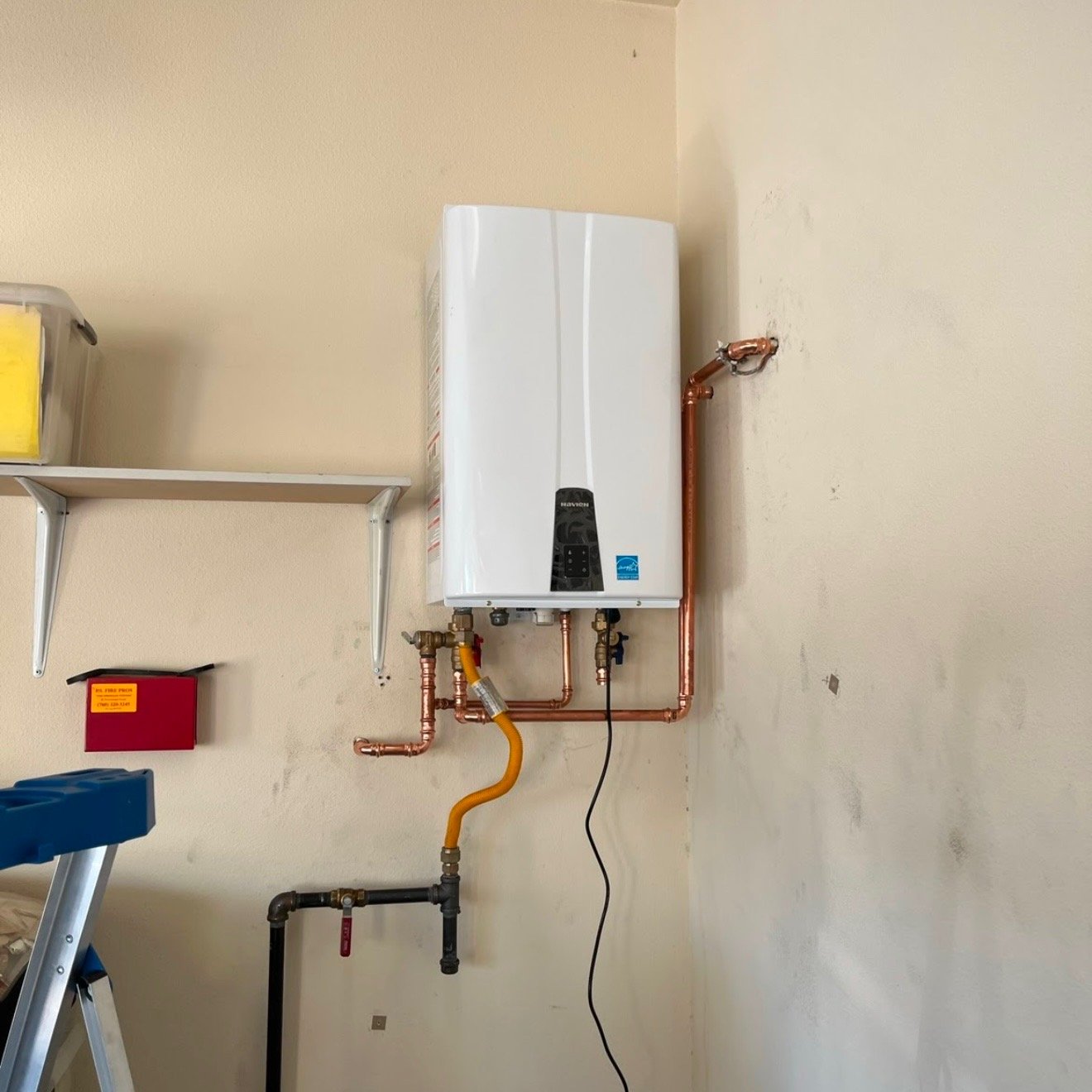 Tankless water heater installed by Torres